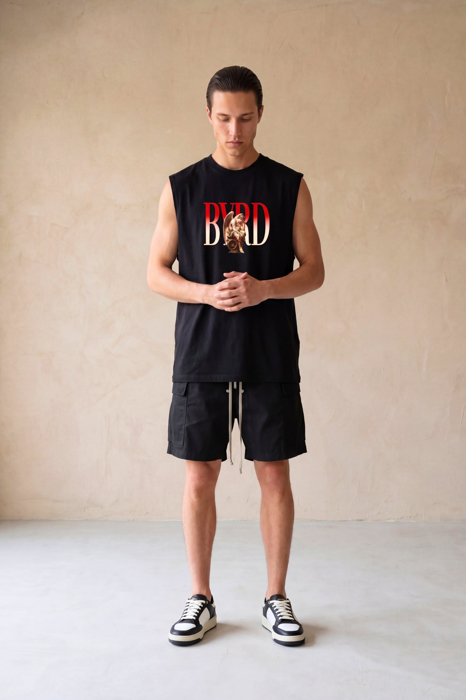 AMOUR SAUVAGE SLEEVELESS OVERSIZED TEE